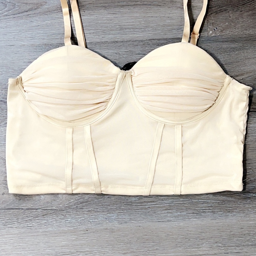 Brand new cream bustier top, size xl very stretchy! Brand new never worn!